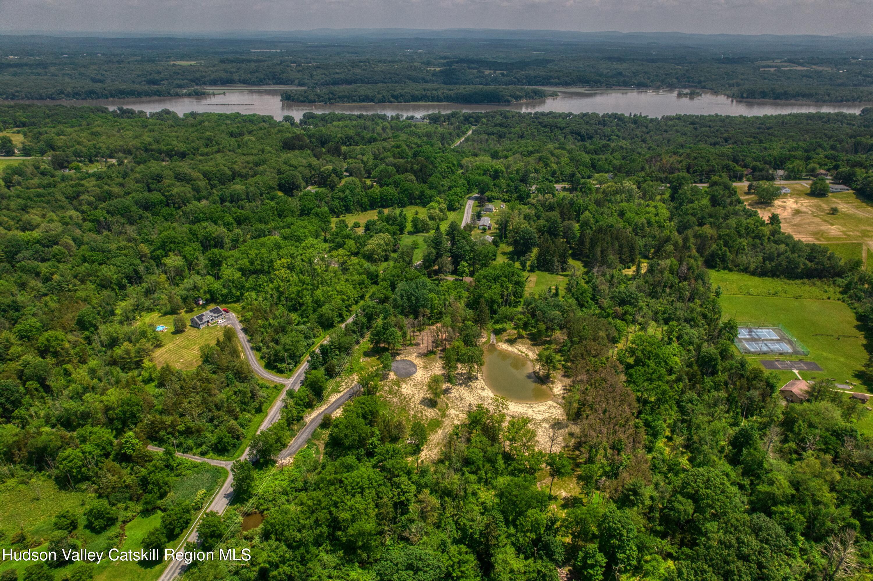 0 Adams Road Coxsackie, NY 12051 - Photo 18 of 23 a view of a lake and green valley