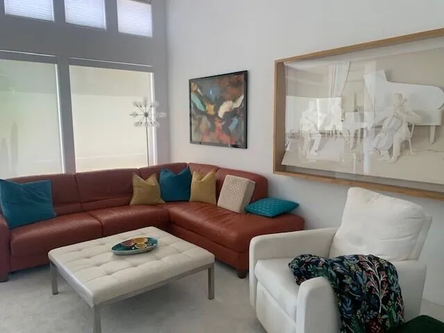 a living room with furniture and a couch