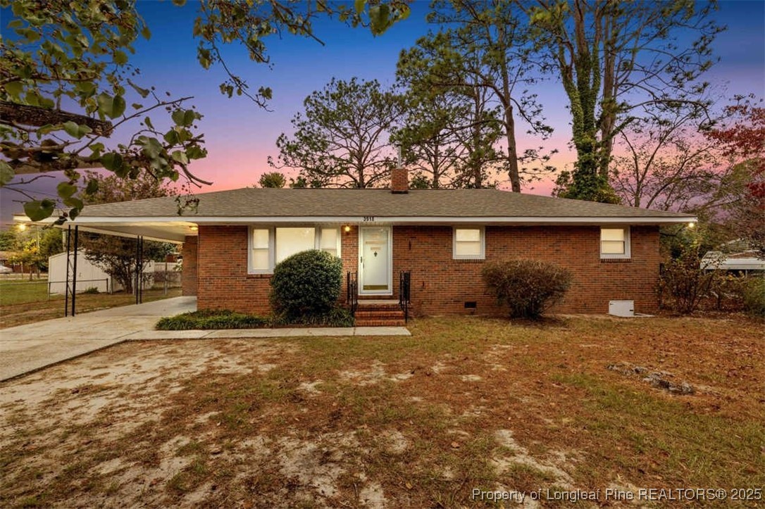 front view of a house with a big yard