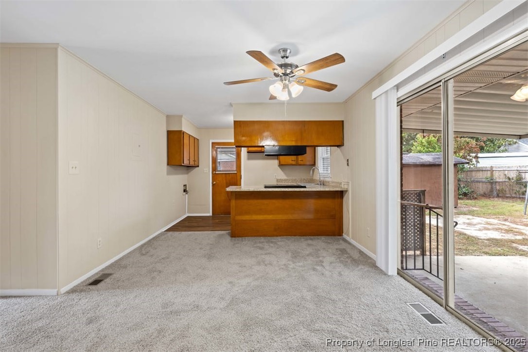 3918 Glenridge Road Fayetteville, NC 28304 - Photo 22 of 31 a view of kitchen with refrigerator and window