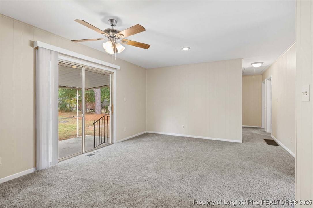 3918 Glenridge Road Fayetteville, NC 28304 - Photo 24 of 31 an empty room with fan and windows