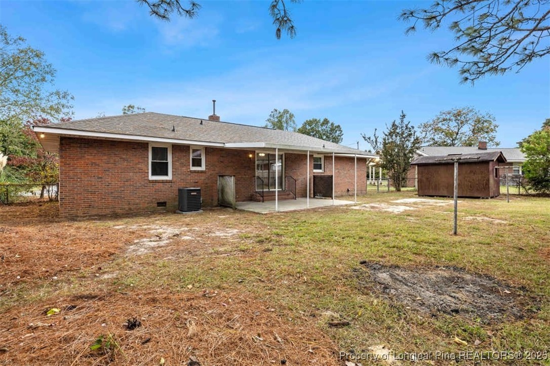 3918 Glenridge Road Fayetteville, NC 28304 - Photo 28 of 31 a view of a house with a backyard