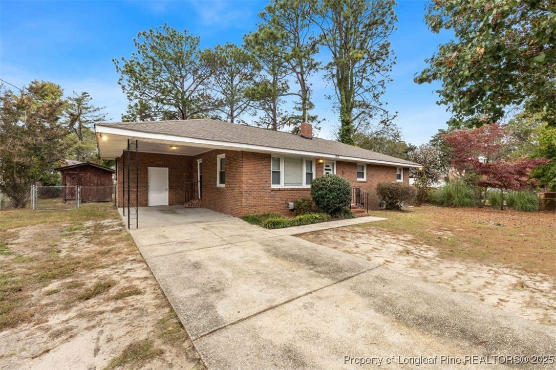 3918 Glenridge Road Fayetteville, NC 28304 - Photo 4 of 31 a view of a house with a yard
