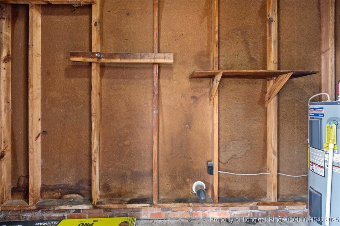 3918 Glenridge Road Fayetteville, NC 28304 - Photo 5 of 31 a view of a bathroom with a shower