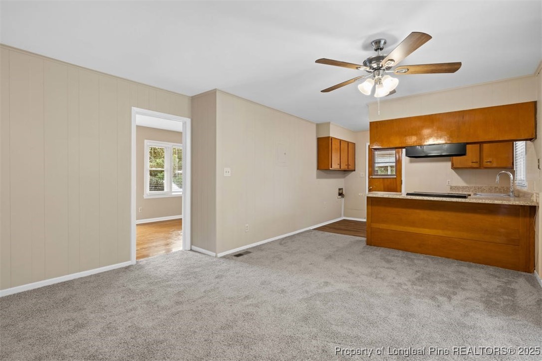 3918 Glenridge Road Fayetteville, NC 28304 - Photo 9 of 31 a view of an empty room with a window
