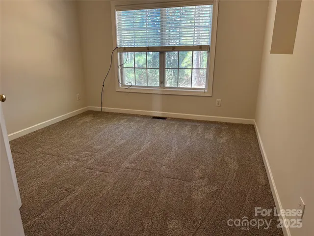 a view of entryway with a front door