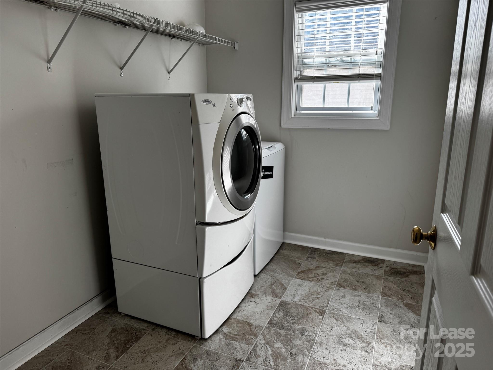 15628 Sullivan Ridge Drive Charlotte, NC 28277 - Photo 18 of 29 a utility room with dryer and washer
