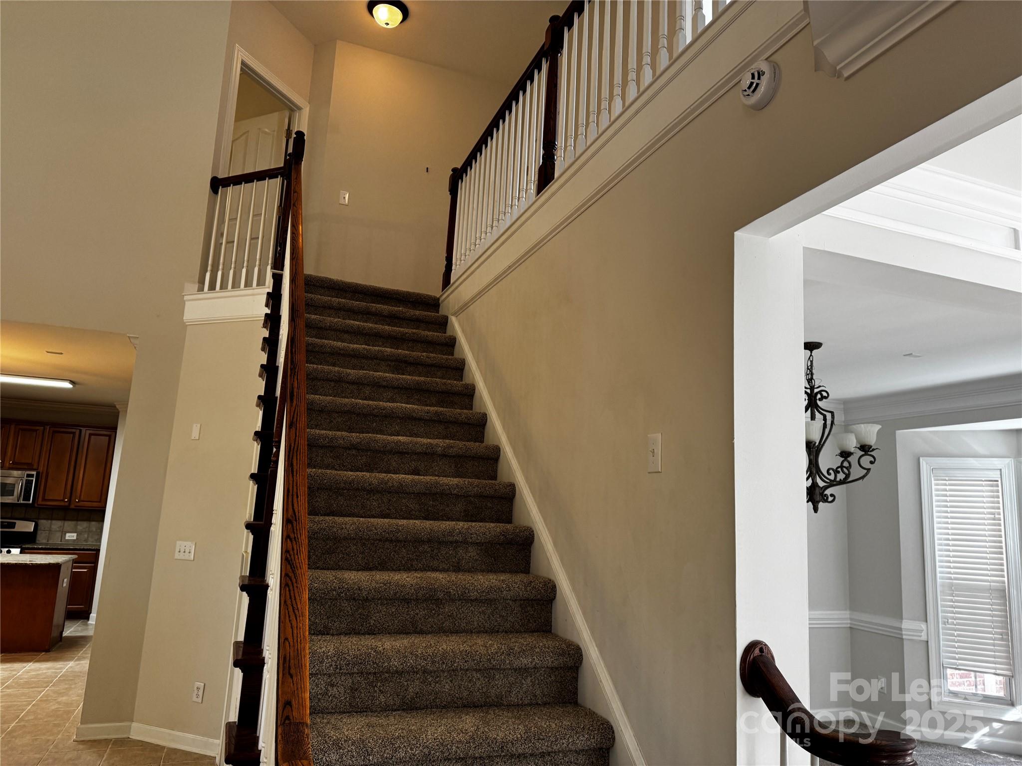 15628 Sullivan Ridge Drive Charlotte, NC 28277 - Photo 6 of 29 a view of entryway and gallery with wooden floor