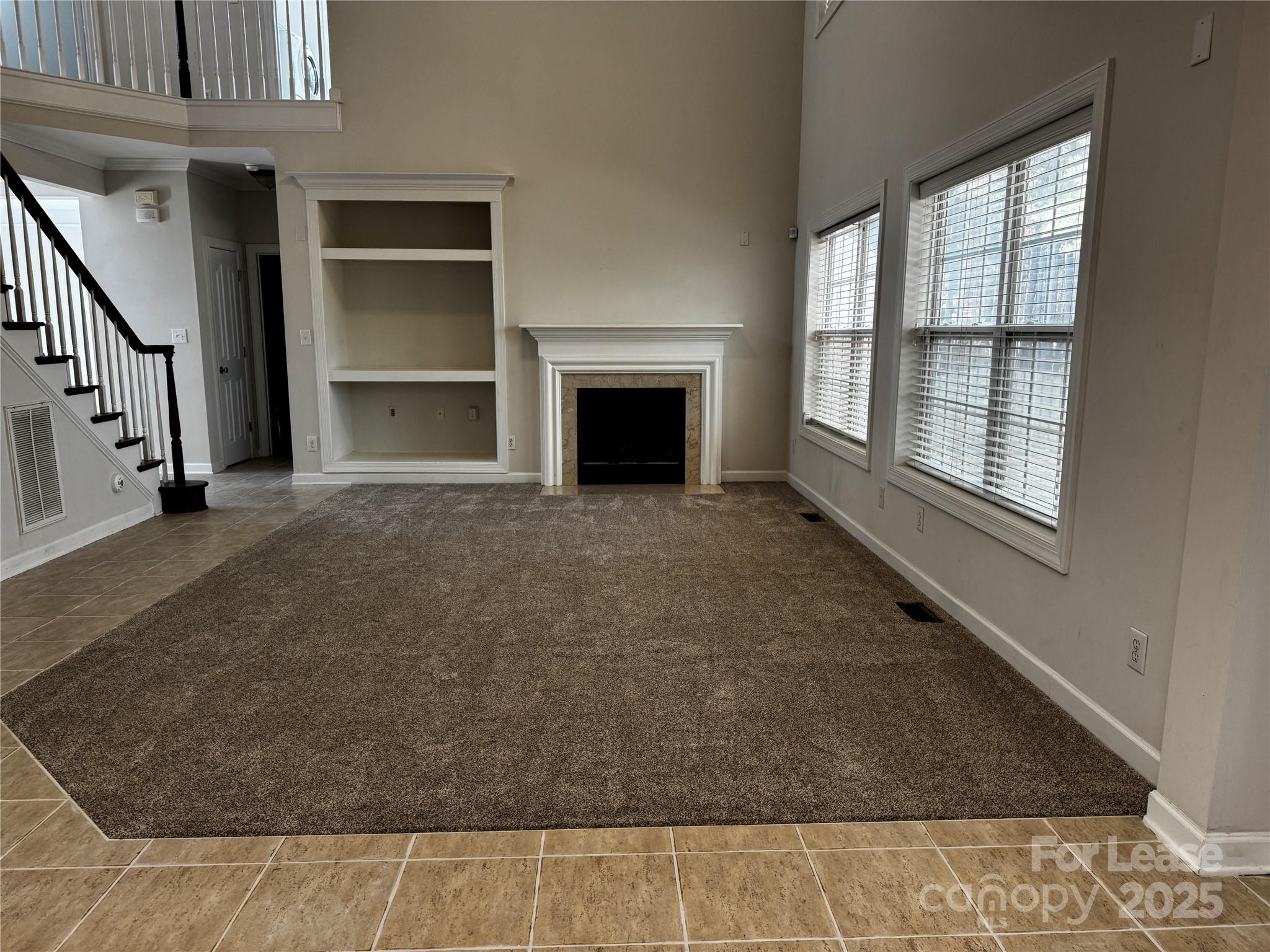 15628 Sullivan Ridge Drive Charlotte, NC 28277 - Photo 7 of 29 an empty room with windows