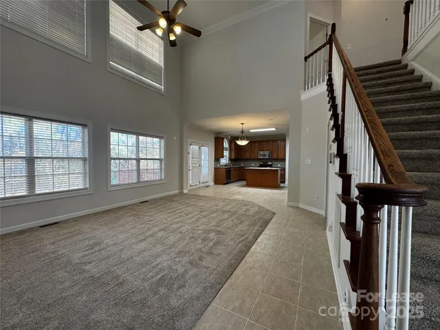 wooden floor in an empty room with a fireplace