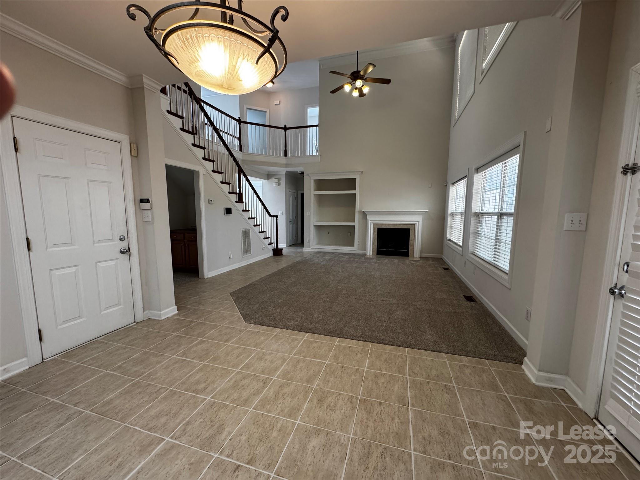 15628 Sullivan Ridge Drive Charlotte, NC 28277 - Photo 9 of 29 wooden floor in an empty room with a fireplace
