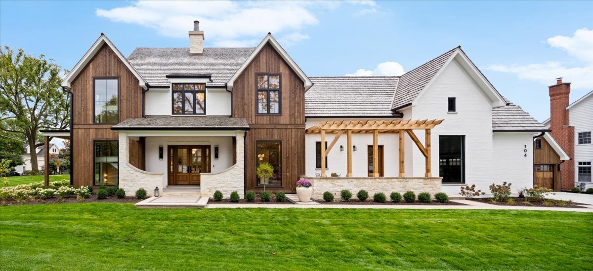 front view of a house with a yard