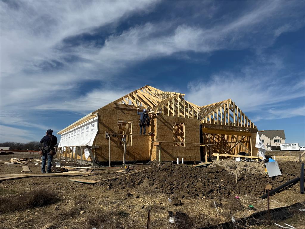 201 Protection Street Godley, TX 76044 - Photo 3 of 3 a view of a large house with a yard and wooden fence