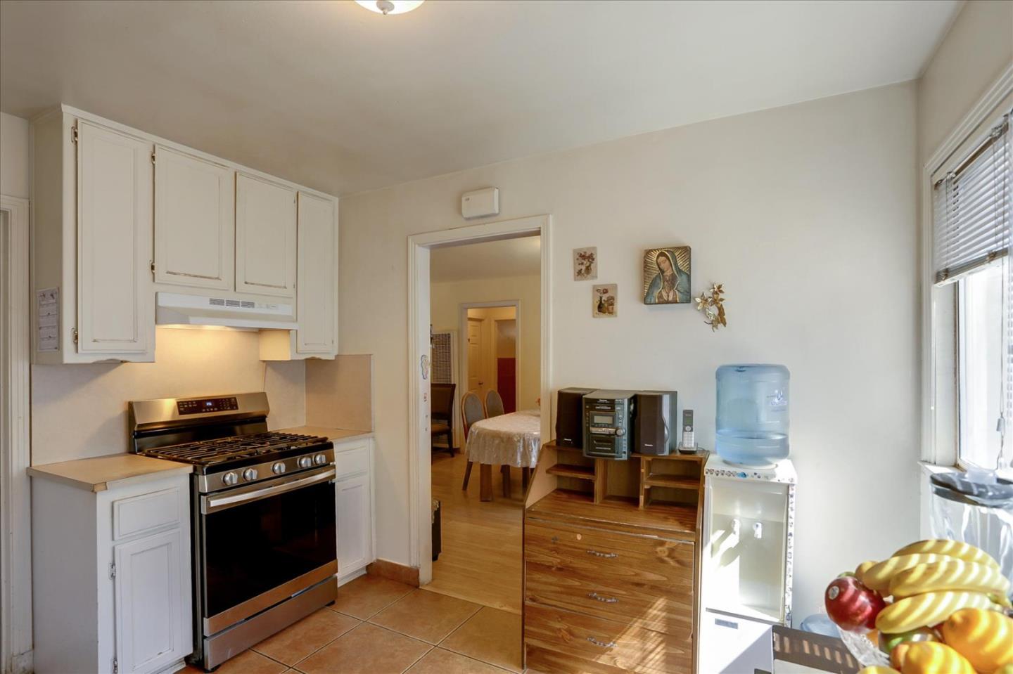 402 Haven Drive King City, CA 93930 - Photo 11 of 22 a kitchen with stainless steel appliances granite countertop a stove and a refrigerator