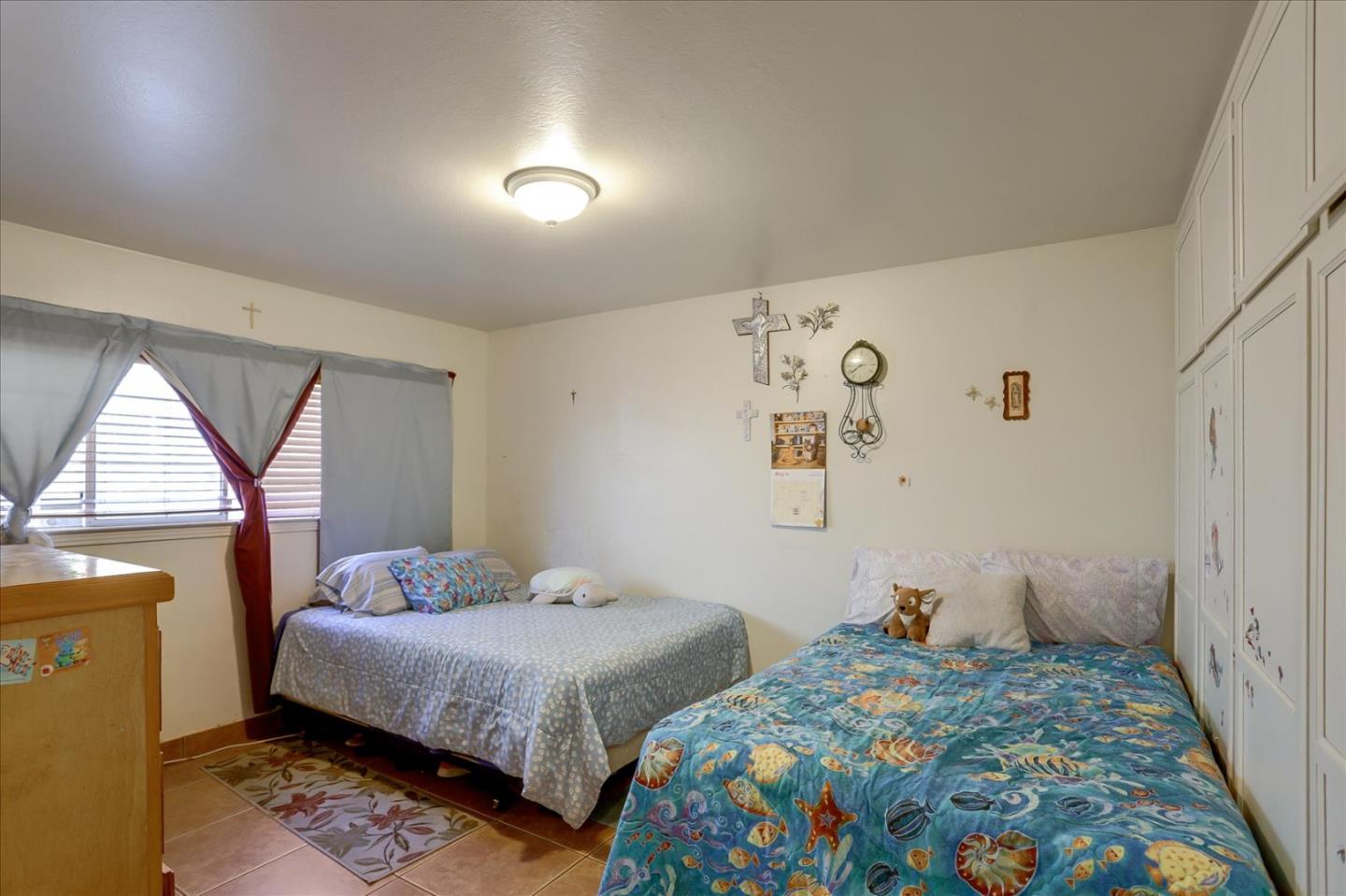 402 Haven Drive King City, CA 93930 - Photo 15 of 22 a bedroom with two beds and a window