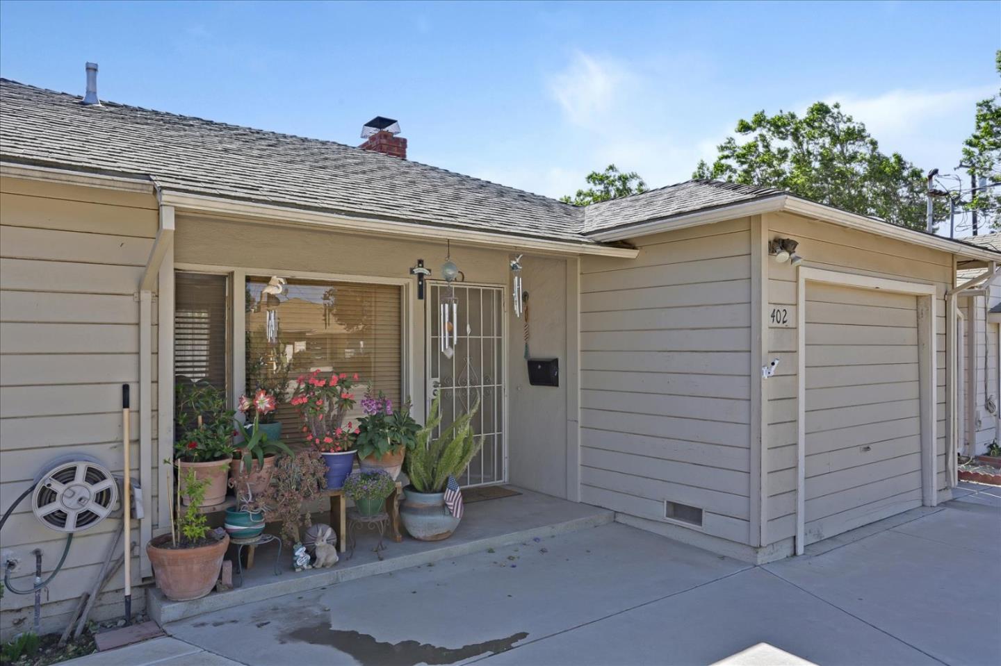 402 Haven Drive King City, CA 93930 - Photo 5 of 22 a view of a house with a potted plant