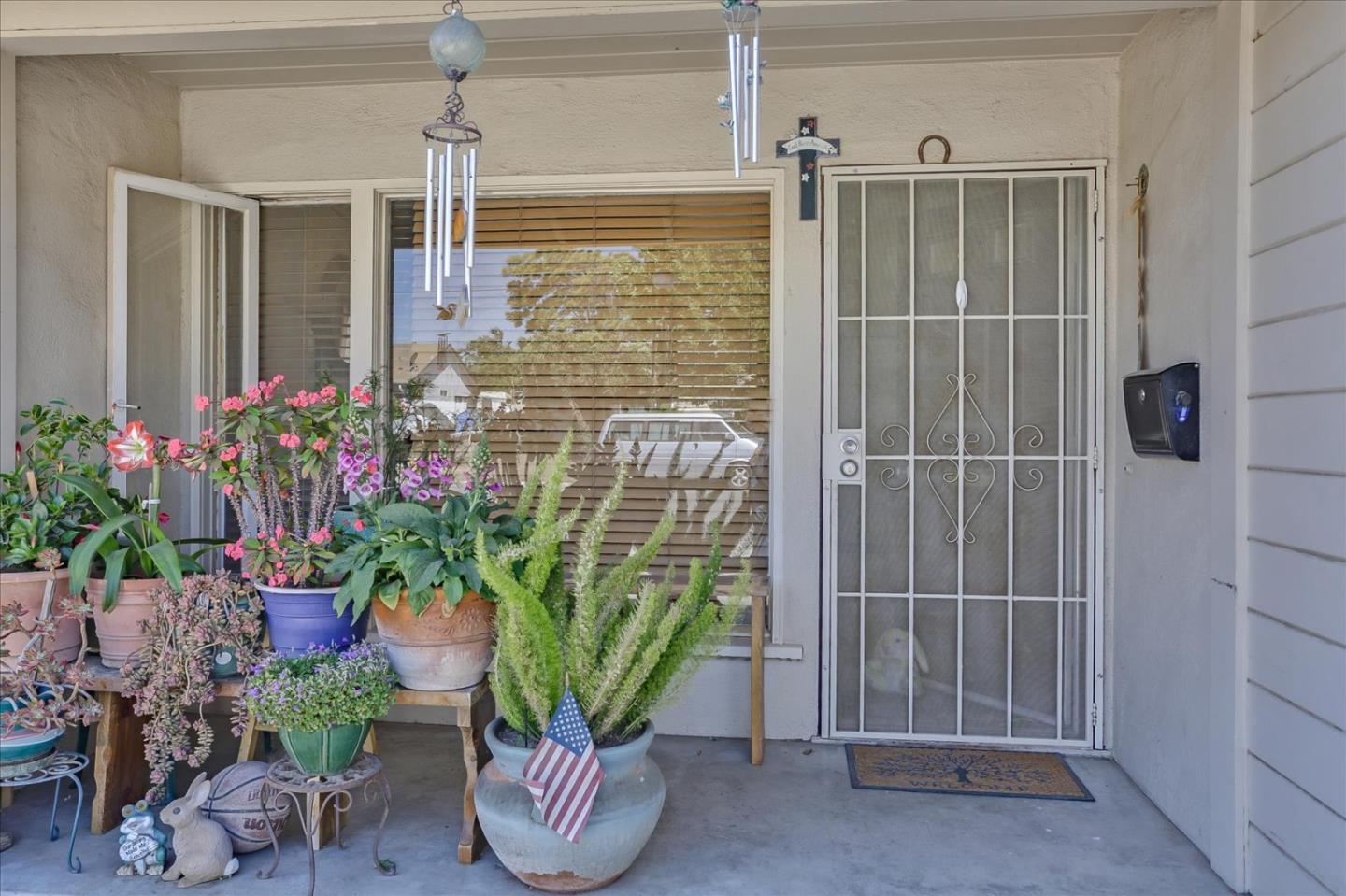 402 Haven Drive King City, CA 93930 - Photo 6 of 22 a potted plant sitting in front of a door