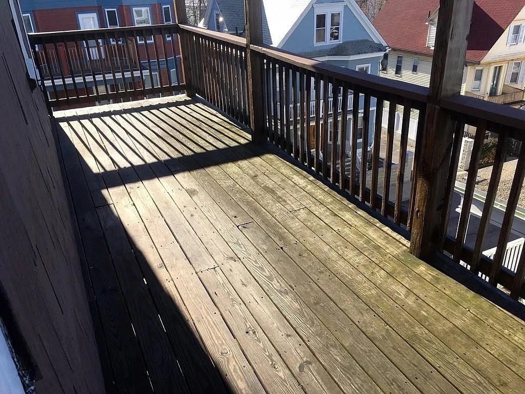 205 Hamilton Street, Unit 3 Boston, MA 02122 - Photo 9 of 9 a view of balcony with wooden floor