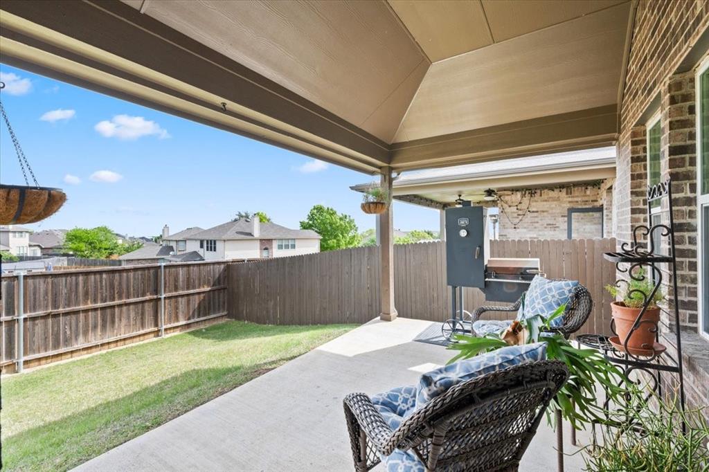 448 Windy Knoll Road Fort Worth, TX 76028 - Photo 32 of 40 Covered patio, perfect to enjoy your favorite beverage!