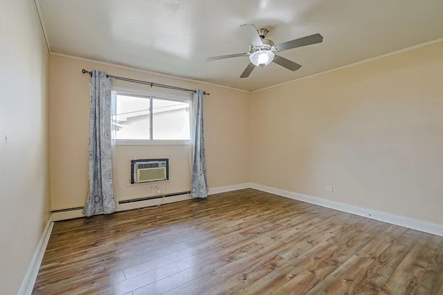 a view of a bathroom from a hallway