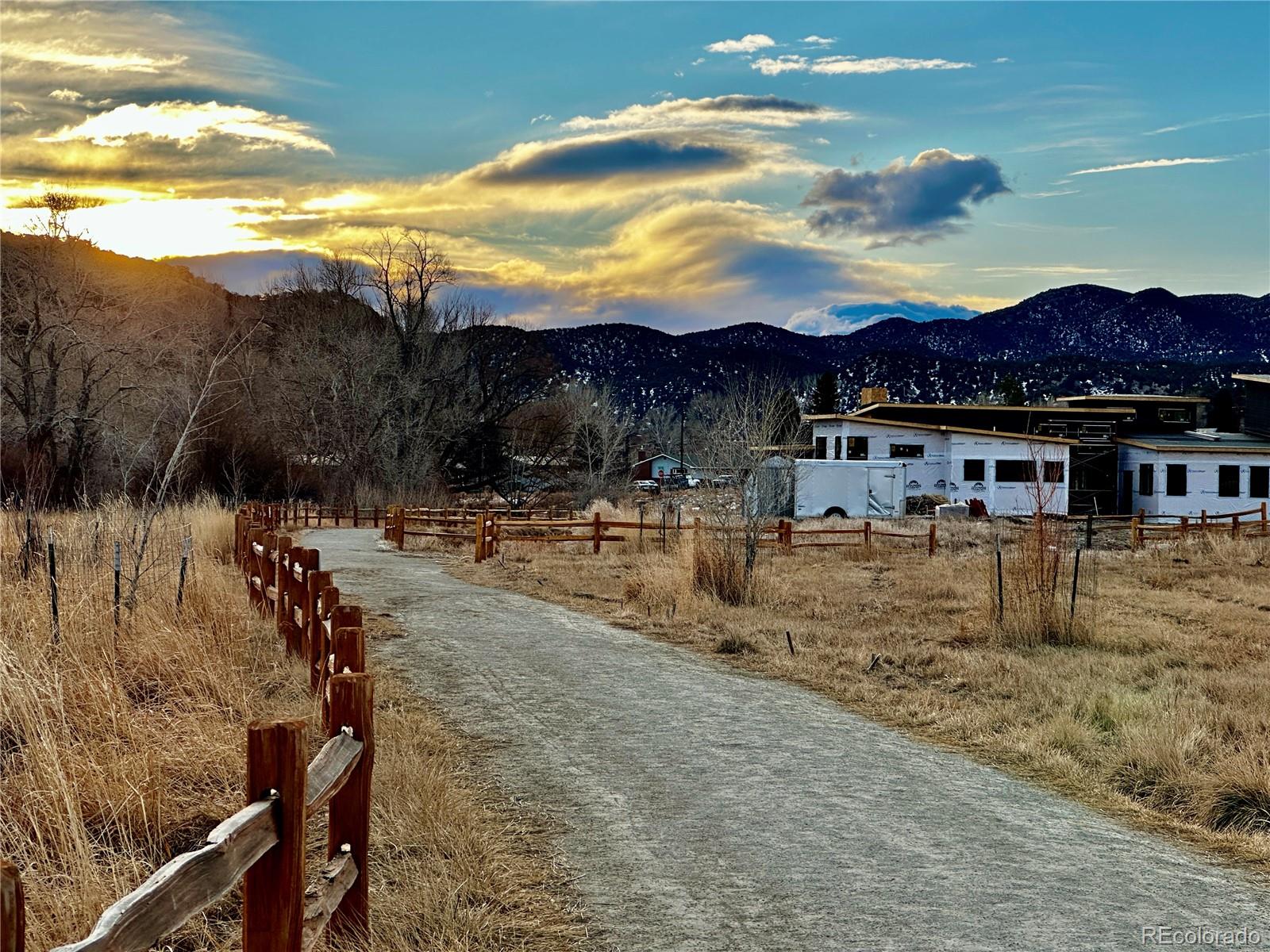 277 Southside Loop Salida, CO 81201 - Photo 6 of 14 a view of a house with a yard