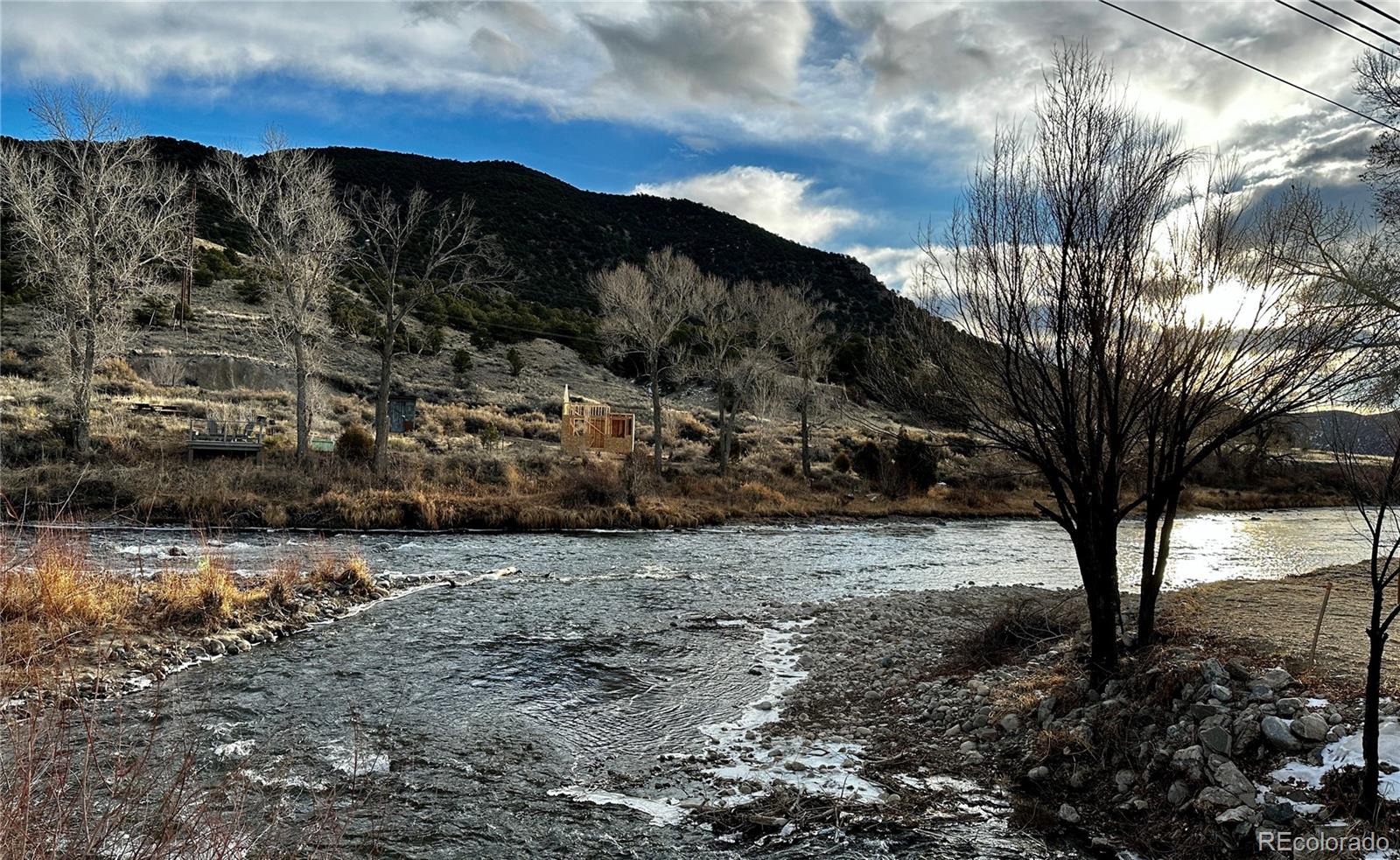 277 Southside Loop Salida, CO 81201 - Photo 9 of 14 a view of a yard with wooden fence