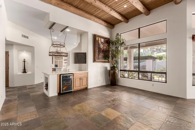 a kitchen with stainless steel appliances granite countertop a sink and cabinets