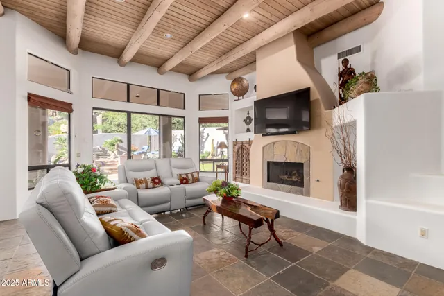 a kitchen with granite countertop a stove and a refrigerator