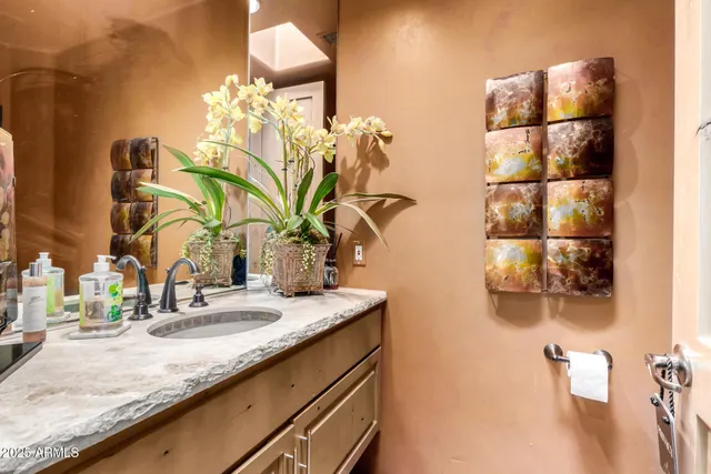 a bathroom with a shower a toilet and a tub