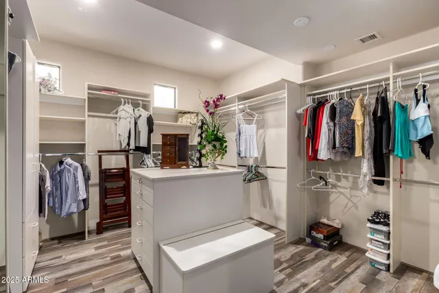 a backyard of a house with yard and outdoor seating