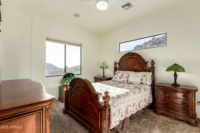 a lobby with furniture and floor to ceiling windows
