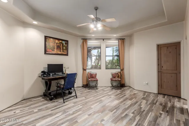 a view of a chairs and table in the patio