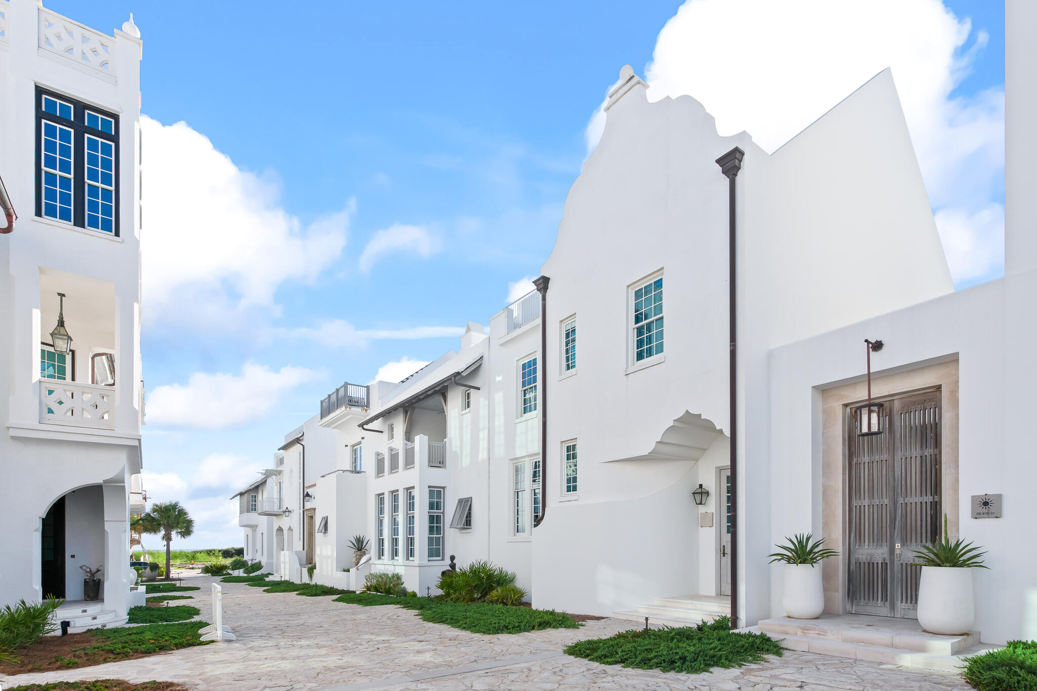 32 Shinbone Court Inlet Beach, FL 32461 - Photo 40 of 53 a view of a white building among the street