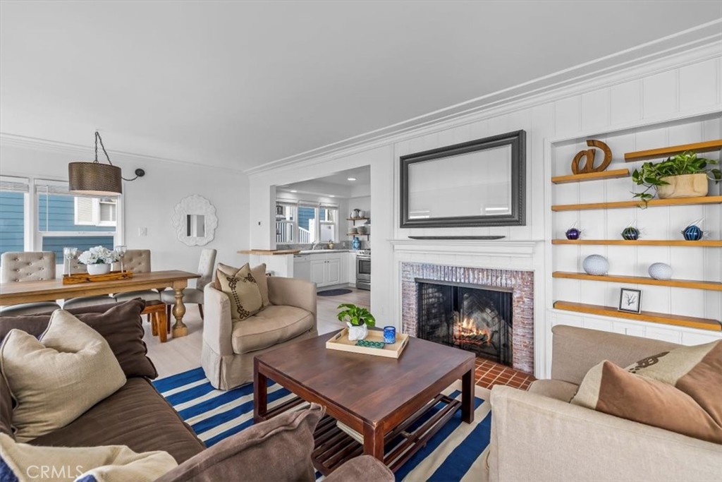 2000 The Strand Manhattan Beach, CA 90266 - Photo 11 of 57 a living room with furniture fireplace and window