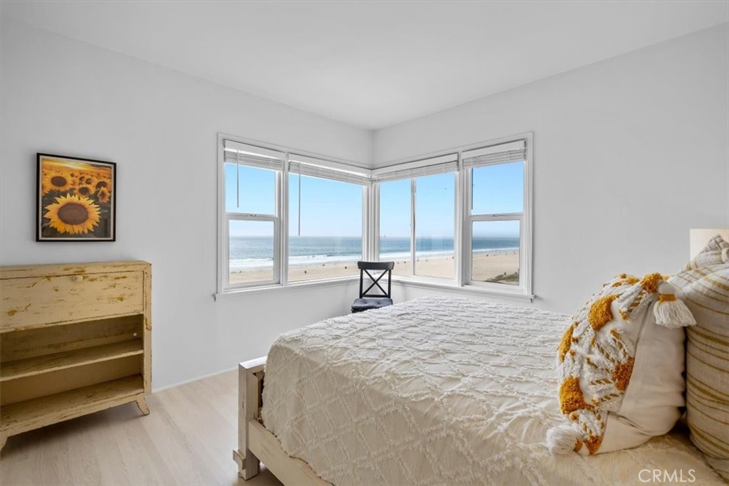 2000 The Strand Manhattan Beach, CA 90266 - Photo 28 of 57 a bedroom with a bed and a large window