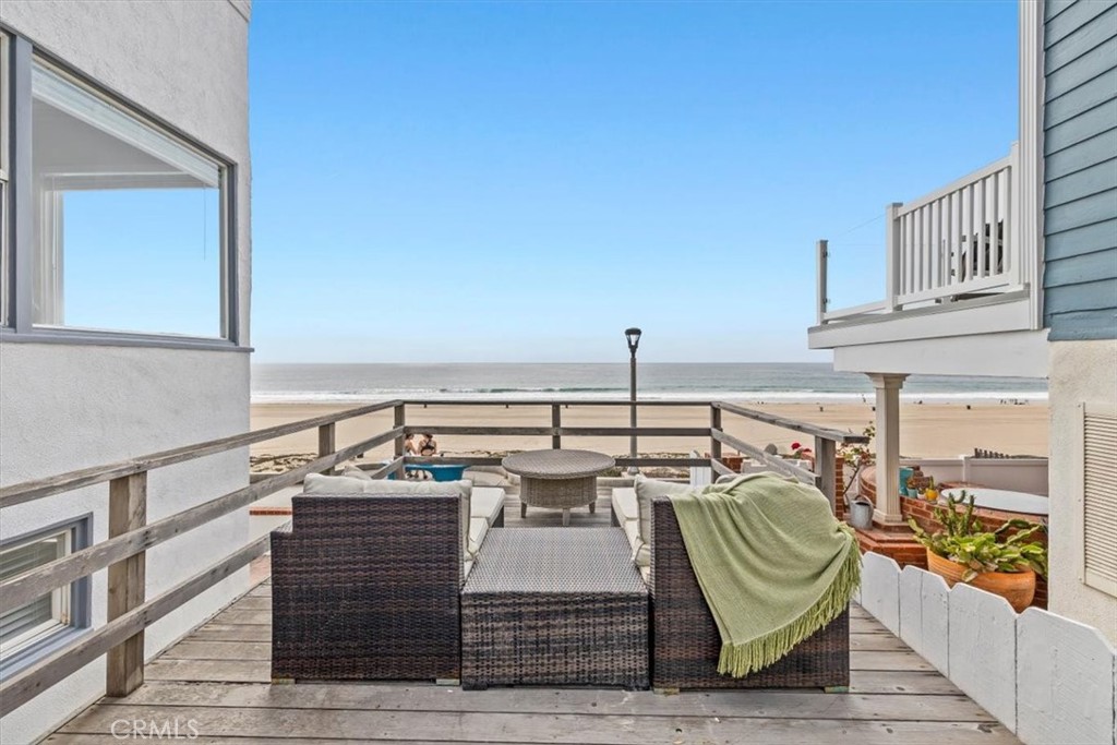 2000 The Strand Manhattan Beach, CA 90266 - Photo 39 of 57 a view of balcony with two chairs and a table