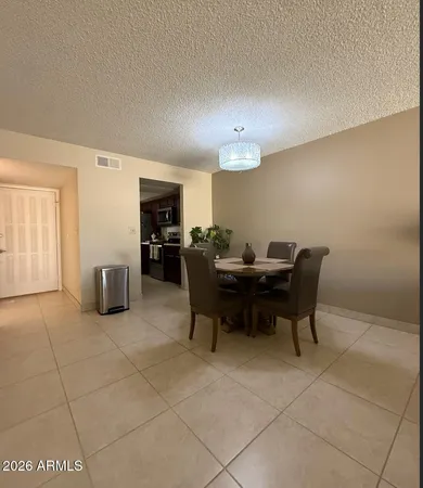 a view of a dining room with furniture