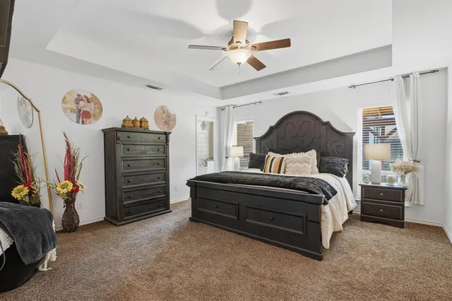 a bedroom with a bed and a walk in closet