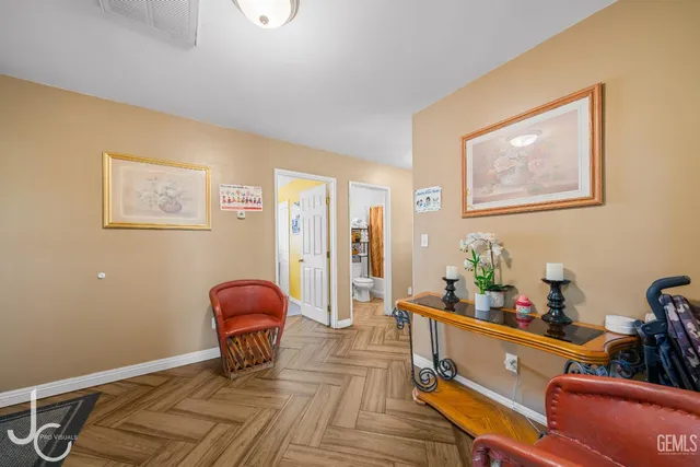 a room with furniture and air hockey table