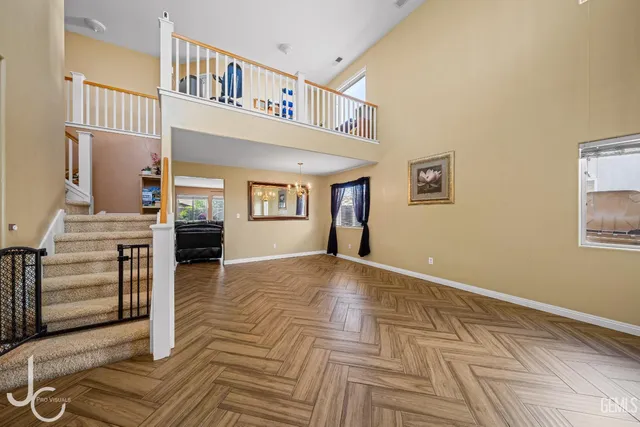 a view of livingroom with hardwood floor and hallway