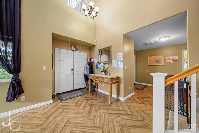 a view of a bedroom with a furniture and entryway