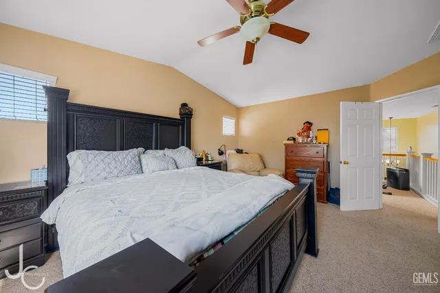 a bed room with a bed and furniture