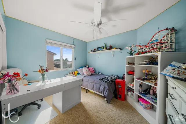 a room with furniture and white walls