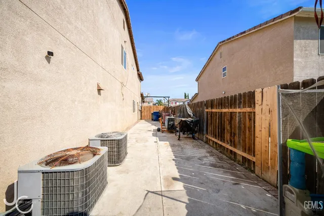 a view of roof deck with patio