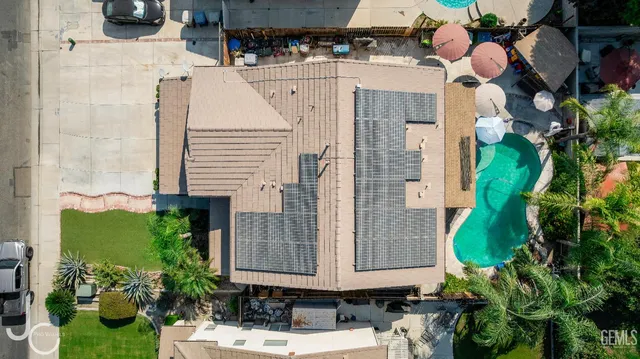 a view of a house with a potted plant