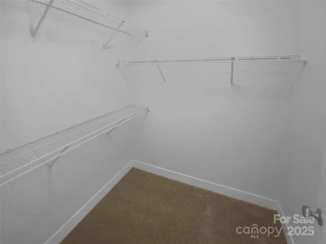 a bathroom with a bathtub and toilet