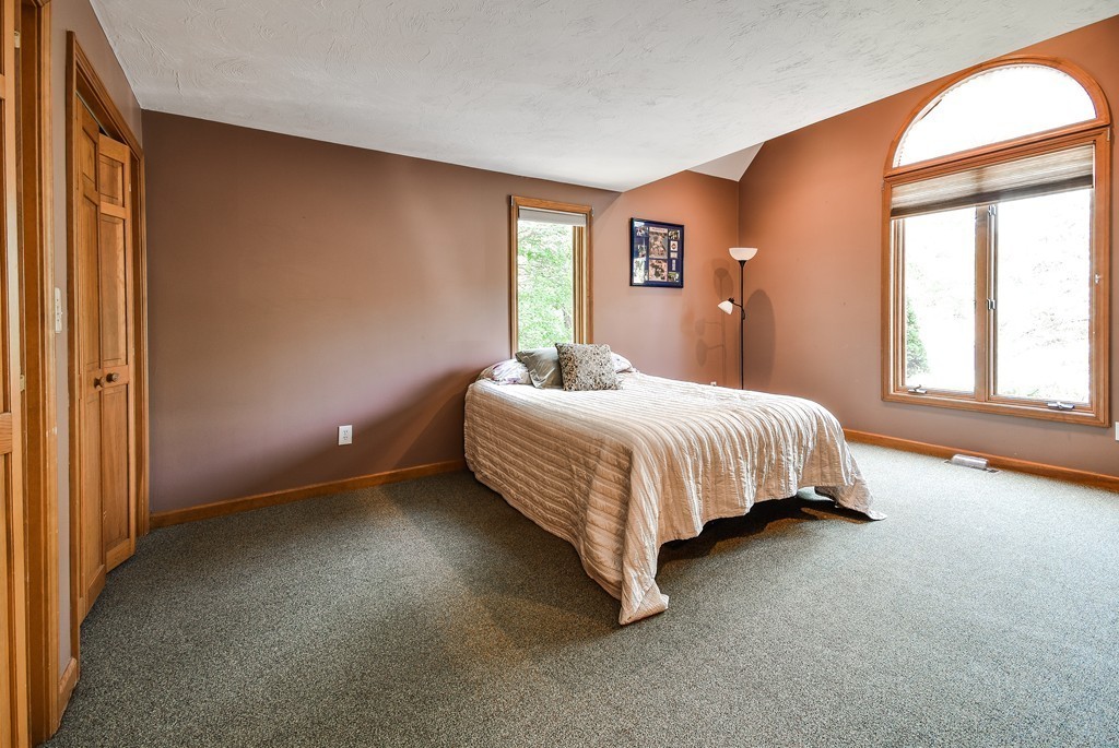 41 Garvey Road Framingham, MA 01701 - Photo 12 of 22 a bedroom with a bed and a window