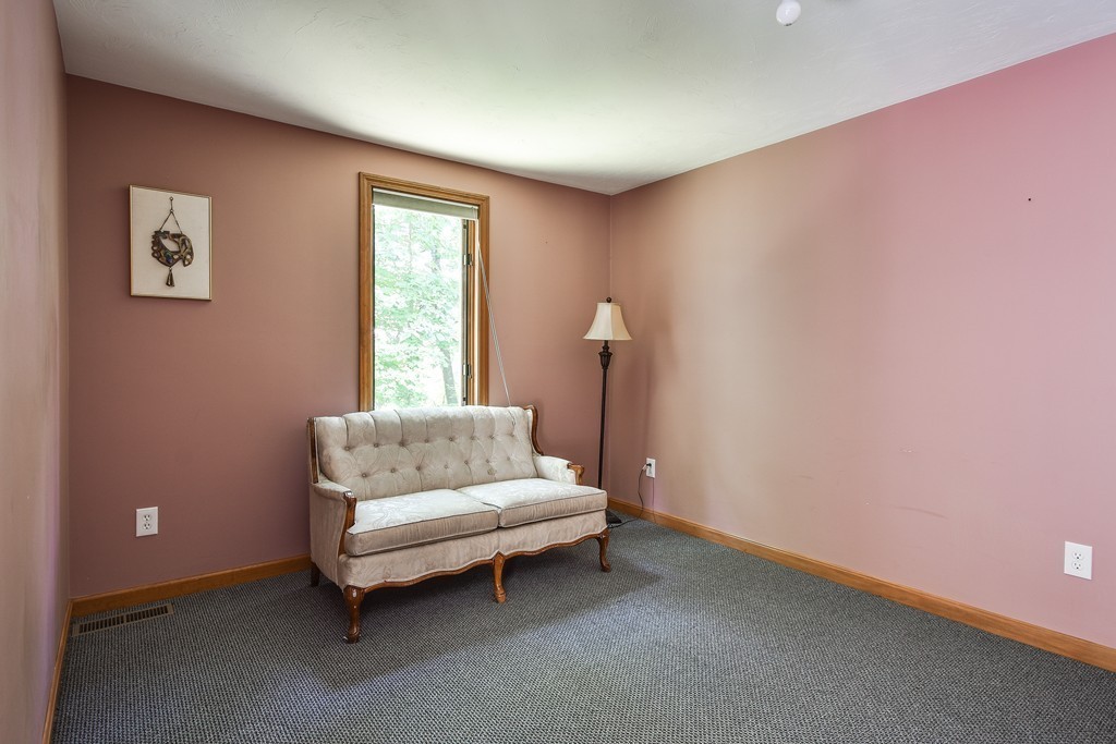 41 Garvey Road Framingham, MA 01701 - Photo 14 of 22 a living room with furniture and a window