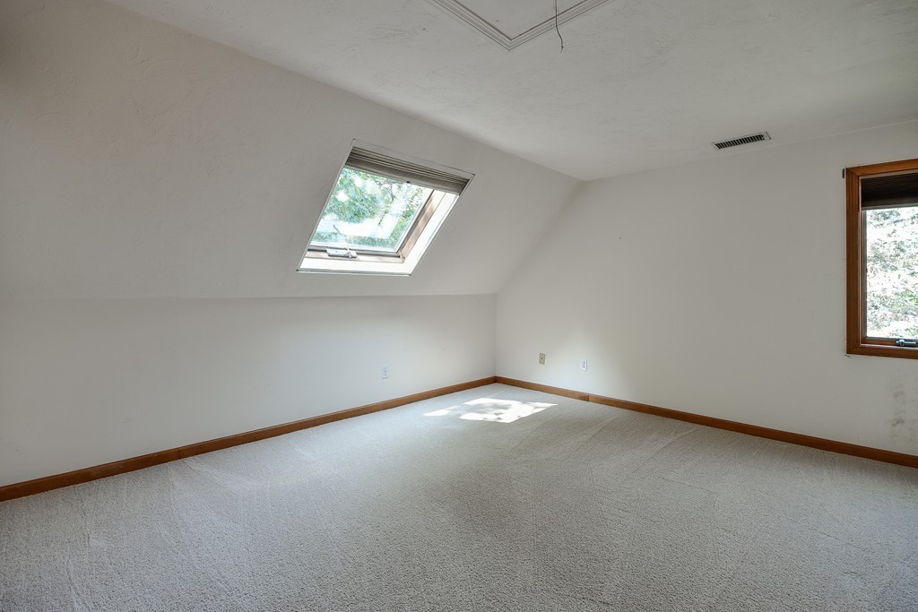 41 Garvey Road Framingham, MA 01701 - Photo 16 of 22 an empty room with a window