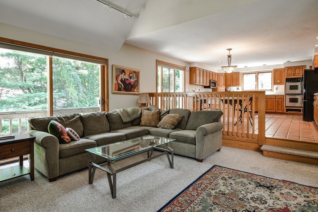 41 Garvey Road Framingham, MA 01701 - Photo 4 of 22 a living room with furniture and a large window